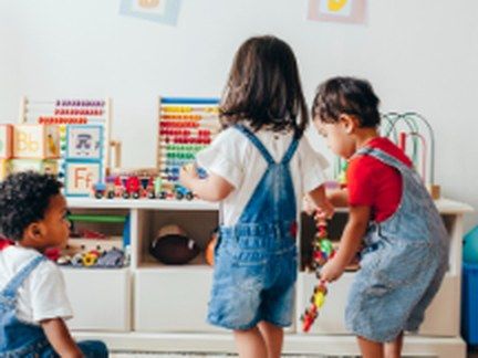 Young children playing in a kids ministry classroom